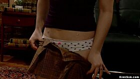 redhead teen's big ass whipped in bondage session