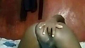 horny kenyan crossdresser strips and fingers his gaping asshole