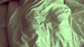 Cute young woman masturbates with dildo for orgasm