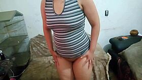 Naughty kitten touches pussy with plug