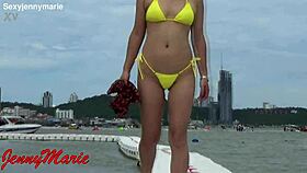 jenny marie shows off her new yellow bikini outdoors
