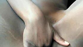 Ebony woman performs juicy webcam session with wet clothes ripped