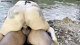 outdoor sex by the river with two hot girls sucking and cumming 😍