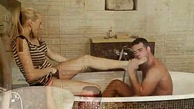 blonde babe strips in bath, teasing with natural tits 😍