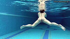 cute shy czech teen swims in pool with shorts