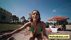 Busty blonde teen gives wet blowjob in public park.