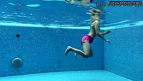 cute shy czech teen swims in pool with shorts