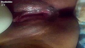 Latina masturbates with vibrator close up