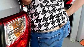 at the car wash, a big ass milf flashes her curves in low rise jeans