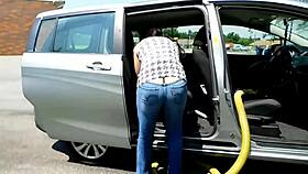 at the car wash, a big ass milf flashes her curves in low rise jeans