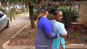 african milf lesbians kiss passionately at public house party