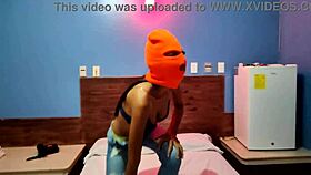 Brunette celebrates Halloween in hotel bed