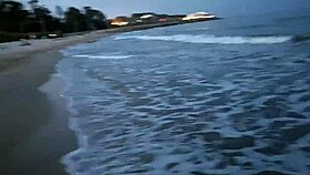 Blonde shows tits and sucks cock on a public beach