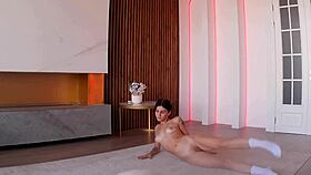 Beautiful young brunette in homemade fitness video