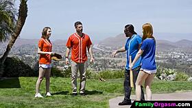 Teens hanging out with older mentors to learn baseball basics together