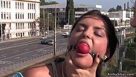 Busty slut tied and gagged, yet craving outdoor banging