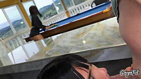 sayafit and anissa miller casually playing with pool balls near the pool