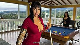 sayafit and anissa miller casually playing with pool balls near the pool