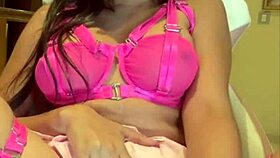 Beautiful Latina teases natural tits while masturbating to climax