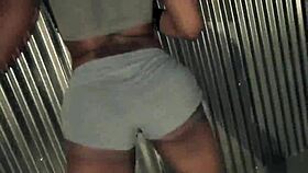 Ebony beauty performs seductive ass shaking striptease with ripped clothes