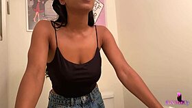 Getting steamy in the bathroom, beautiful sultry Jenna Foxx performs a solo striptease teasingly