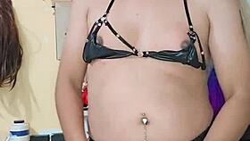 The transsexual masturbates with a rich penis in a calm setting