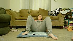 Redhead amateur Anastaisa squirts intensely while fingering her clit in homemade leggings session