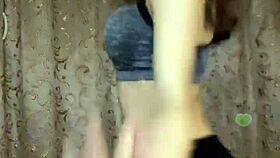 the hot indian model is posing sexily for the camera