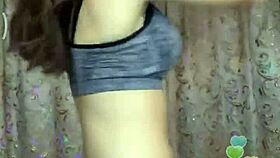 the hot indian model is posing sexily for the camera