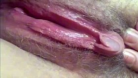 Teasing my wet pussy by the window hoping for a voyeur