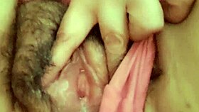 Mature milf masturbates watching porn