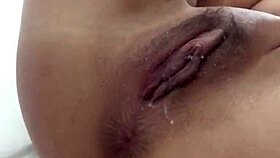 The girl uses chinese balls and vibrator