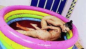 romana ryder and tammie lee rub their naked bodies together in a jam bath