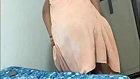 Is this what happens when I record a sexy brunette changing clothes? She starts masturbating.