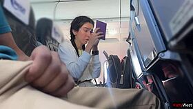 Public airplane flashing leads to quick cum from beautiful girl