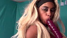 Raunchy black babe Msnovember playing around naked with her curvy booty and giant boobies jigging hard on sheisnovember