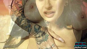 Busty milf joanna angel shows her luscious body with tattoos for playboy