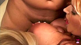 lucky guy gets a tit fuck by two sets of giant tits in lingerie