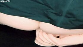 Is this trans woman riding a dildo seductively?