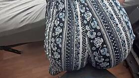 Bouncing ass on his cock in clothes.