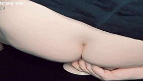 Is this trans woman riding a dildo seductively?