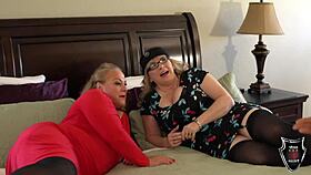 two mature neighbors enjoy a casual afternoon with dildos, vibrators, and other toys in their bedroom