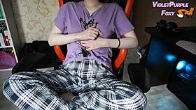 young woman plays with her nipples when she is home alone