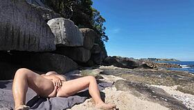 curvy nudist enjoys the beach with her natural hairy body, flashing occasionally