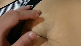 exploring her deep navel in a casual massage session