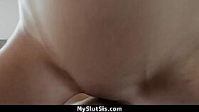 Gorgeous blue-eyed girl plays video game intensely