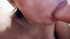 sucking on a big realistic and messy full of milk dildo closeup