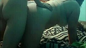 We fuck doggy style on the bed for the webcam