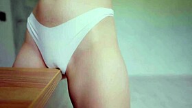 rubbing her wet pussy through panties and jeans to orgasm