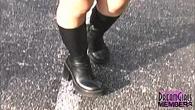 Tanned blonde flashes shaved pussy and natural tits in public park tease